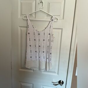 Off white tank top.  Gently worn.